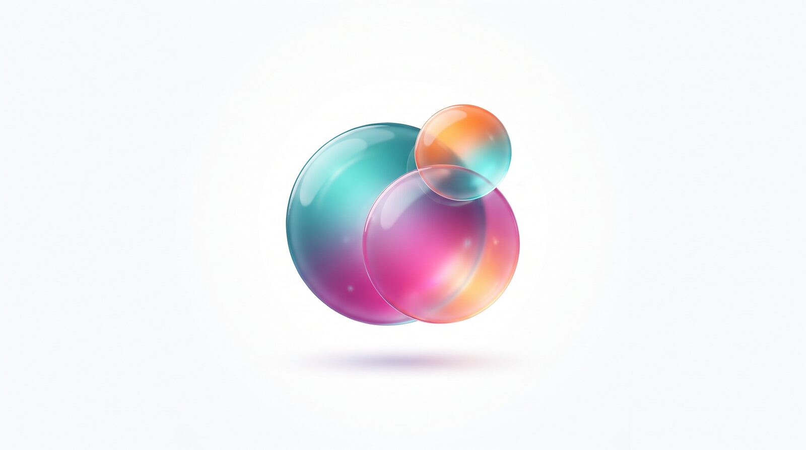 Three overlapping translucent glass orbs in teal, pink and orange, representing StreamPro's core services blending together
